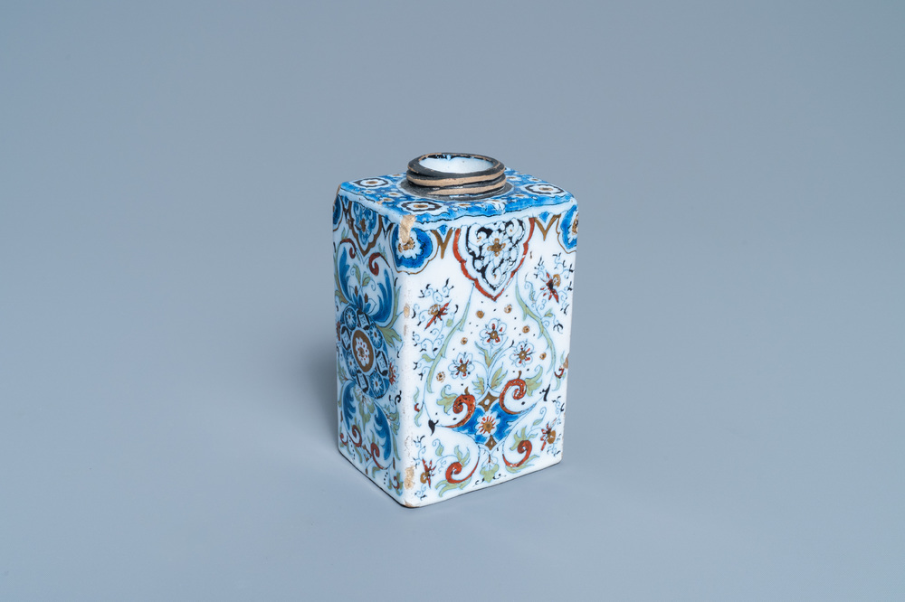 A polychrome Dutch Delft black- and gilt-enhanced tea caddy, late 17th C.