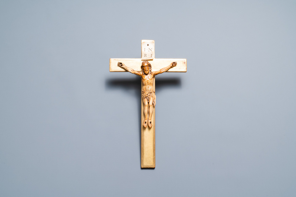 An Indo-Portuguese ivory figure of Christ on a later crucifix, probably Goa, 17th C.