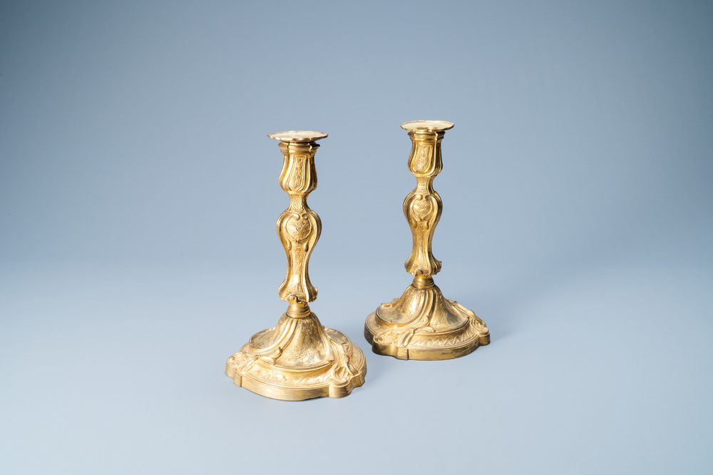 A pair of gilded bronze candlesticks, France, 18th C.