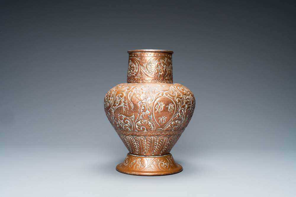 An Italian hammered copper Barberini armorial ewer, 17th C.
