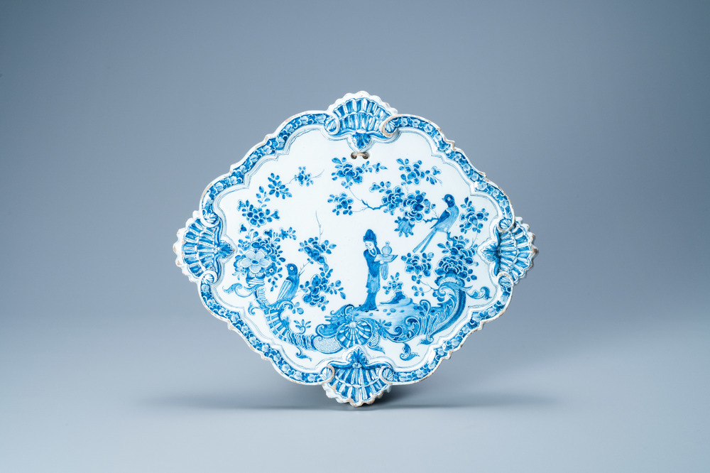 A Dutch Delft blue and white chinoiserie plaque, 18th C.