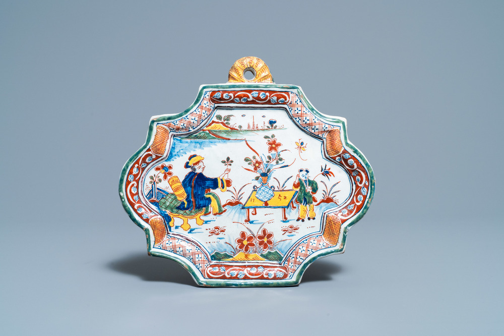 A polychrome Dutch Delft chinoiserie plaque, dated 1752