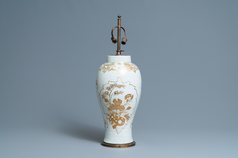 A Chinese parcel-gilt bianco-sopra-bianco vase mounted as a lamp, Qianlong