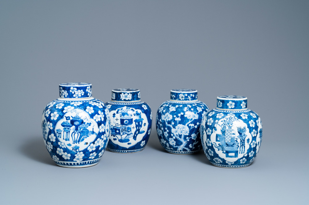 Four Chinese blue and white 'antiquities' jars and covers, 19th C.