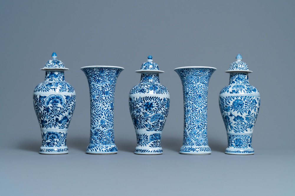 A Chinese blue and white five-piece garniture with floral design, Kangxi
