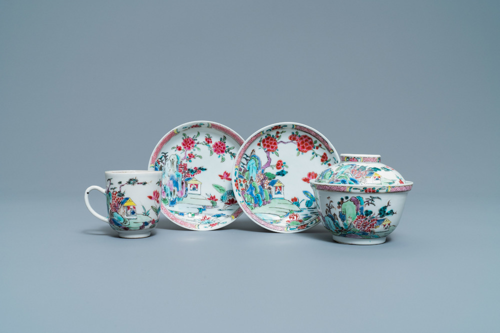 A Chinese famille rose covered bowl, a cup and two saucers with landscape design, Yongzheng