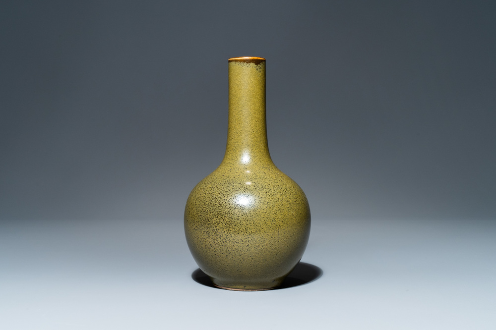 A Chinese monochrome teadust-glazed bottle vase, 19th C.