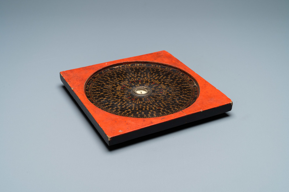 A Chinese lacquered and painted wooden 'Feng Shui' compass, various marks, 19th C.