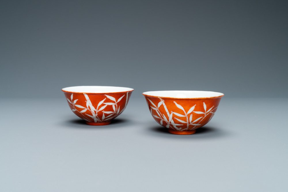 A pair of Chinese 'bamboo' coral red-ground bowls, Xuantong mark, Republic