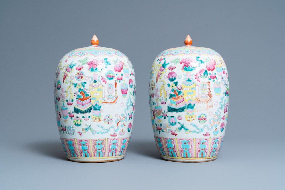 A pair of Chinese famille rose 'antiquities' jars and covers, 19th C.