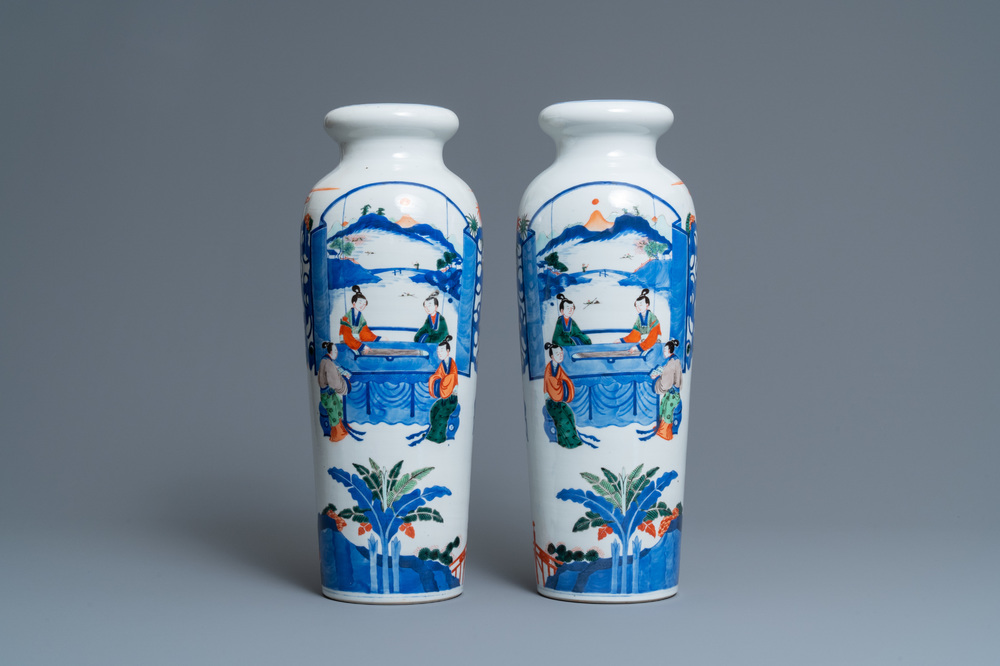 A pair of Chinese wucai rouleau vases, 19th C.
