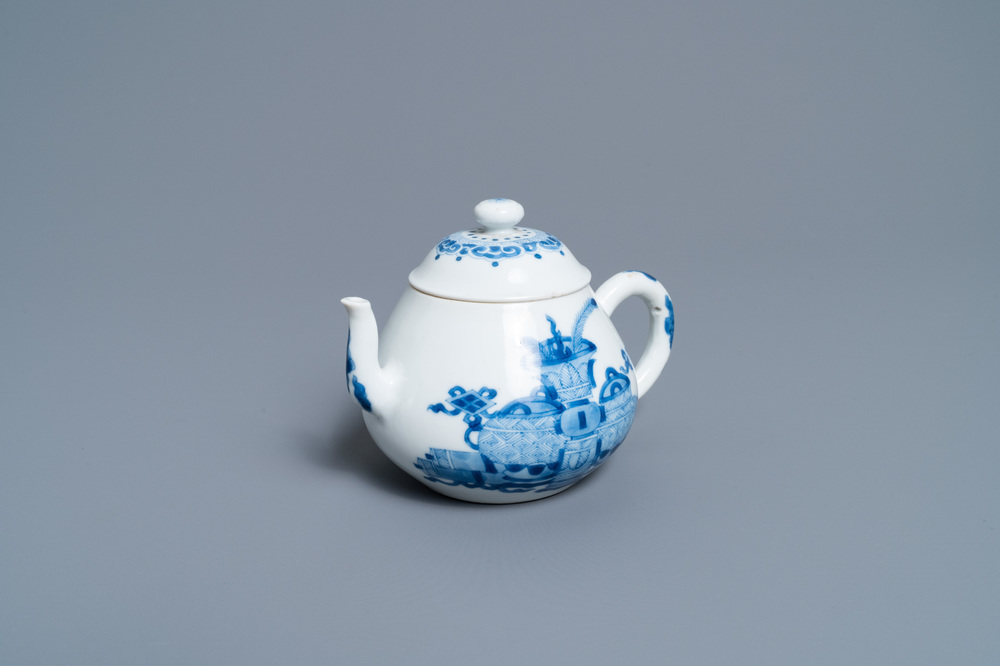 A Chinese blue and white 'antiquities' teapot and cover, Jiajing mark, Kangxi