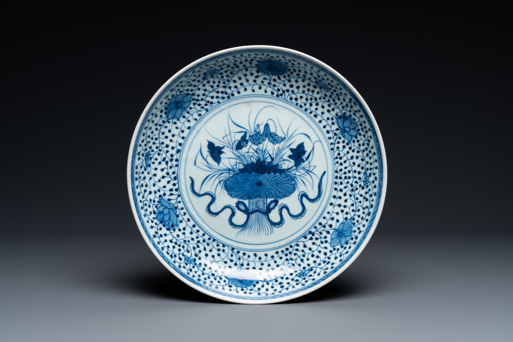 A Chinese blue and white 'lotus bouquet' dish, Qianlong/Jiaqing