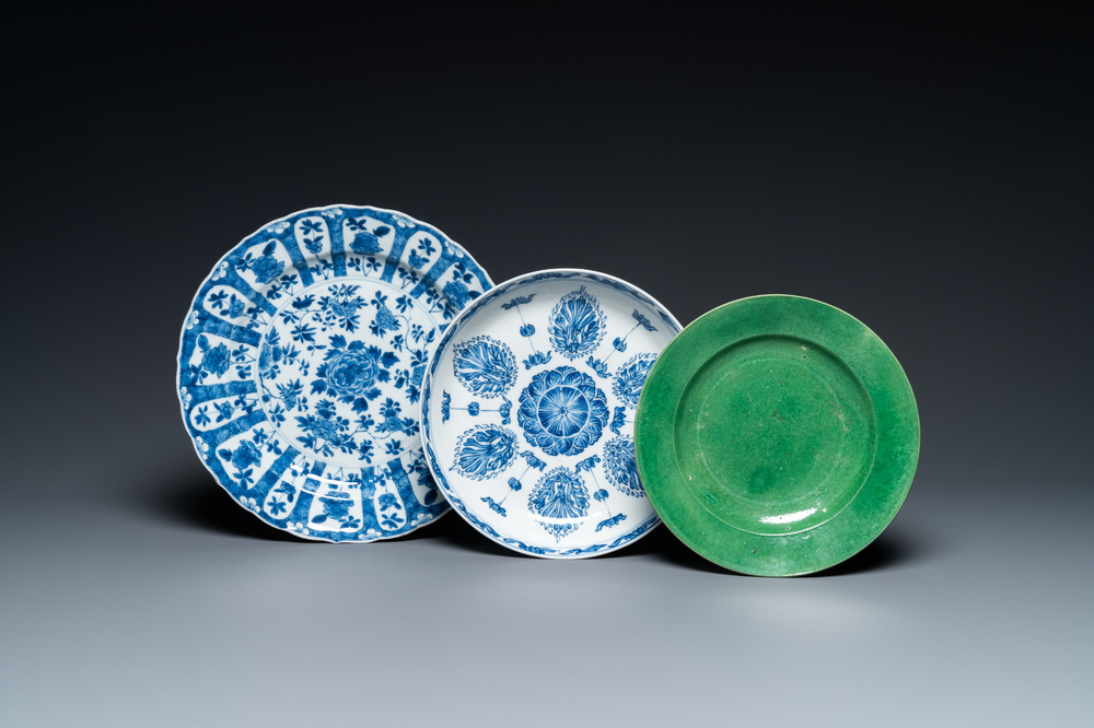 Two Chinese blue and white dishes and a green monochrome plate, Kangxi