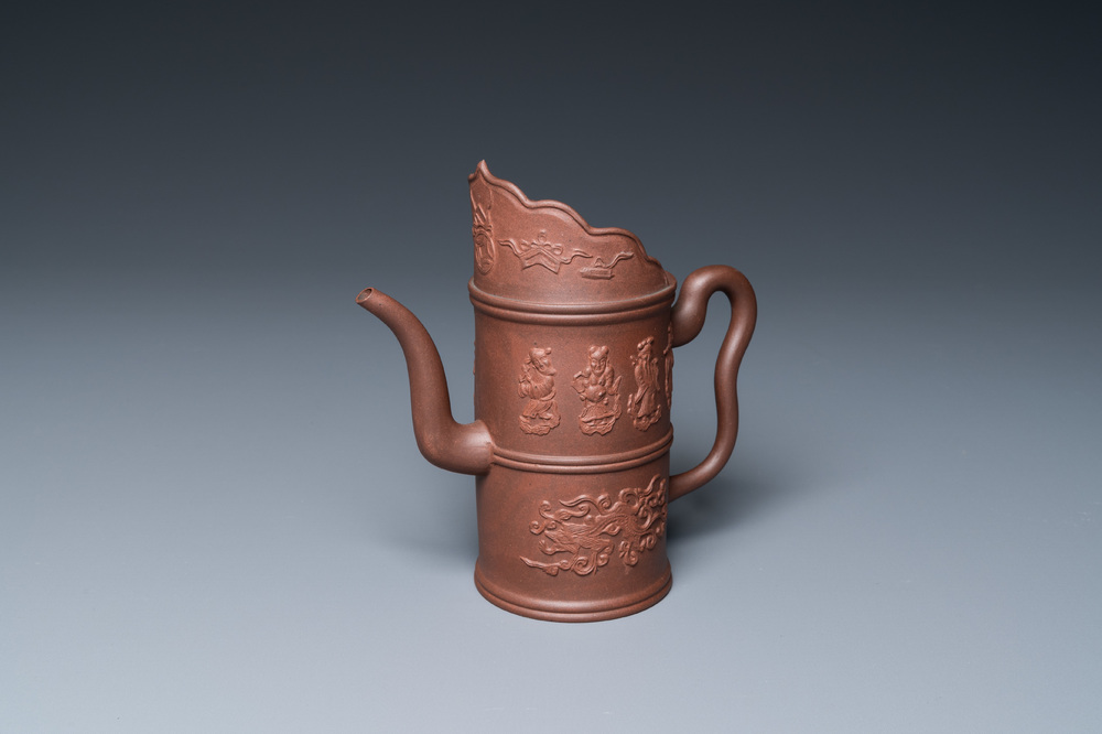 A Chinese Yixing stoneware 'Duomuhu' ewer with immortals, Kangxi