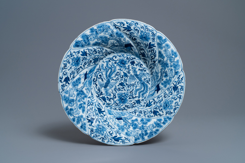A Chinese blue and white gadrooned dish with phoenixes and monkeys, Kangxi