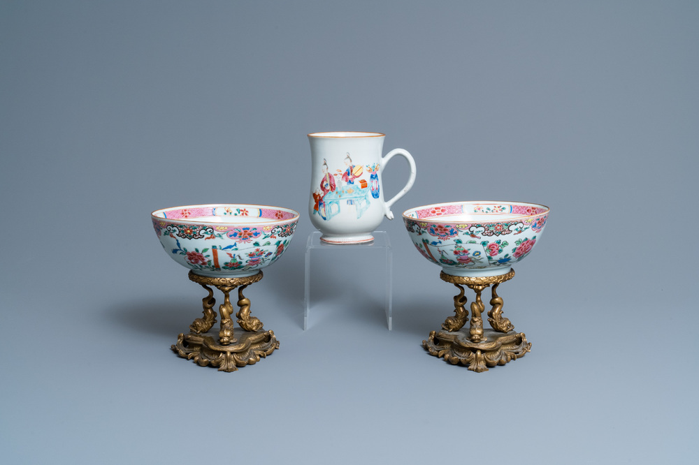 A pair of Chinese famille rose bowls on gilt bronze stand and a 'mandarin' mug, Qianlong