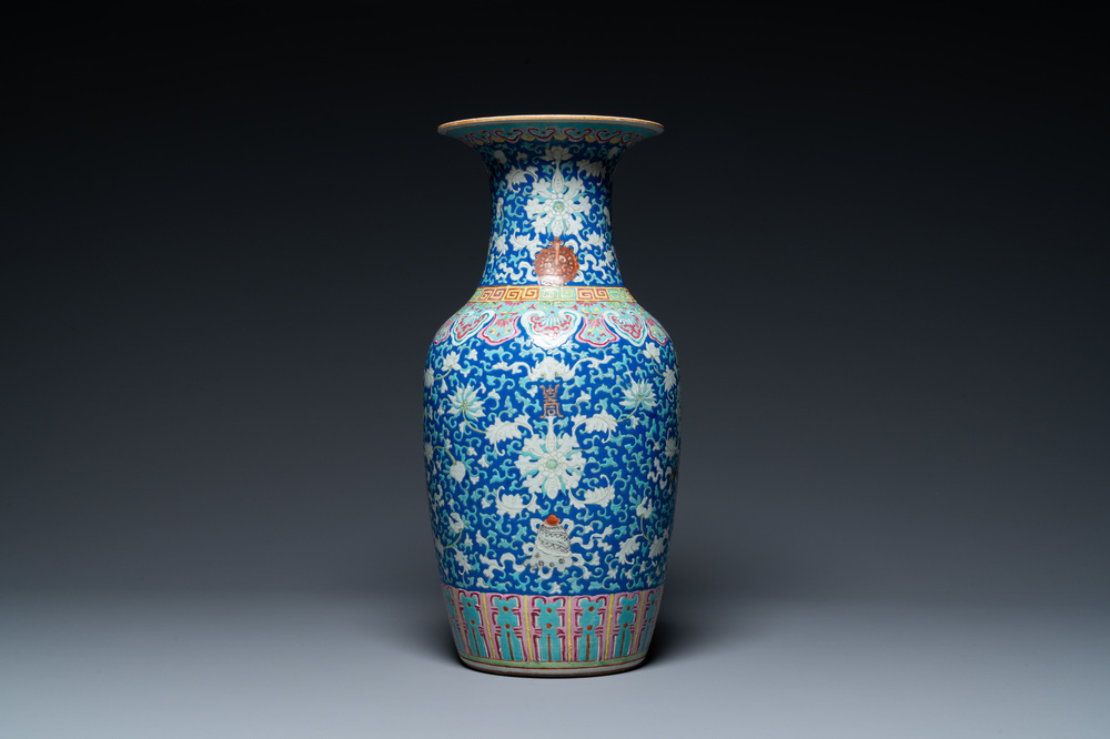 A Chinese famille rose blue-ground 'bajixiang' vase, 19th C.