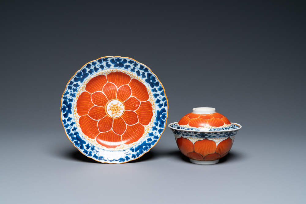 A Chinese iron-red, gilt and blue and white covered bowl on stand, 19th C.