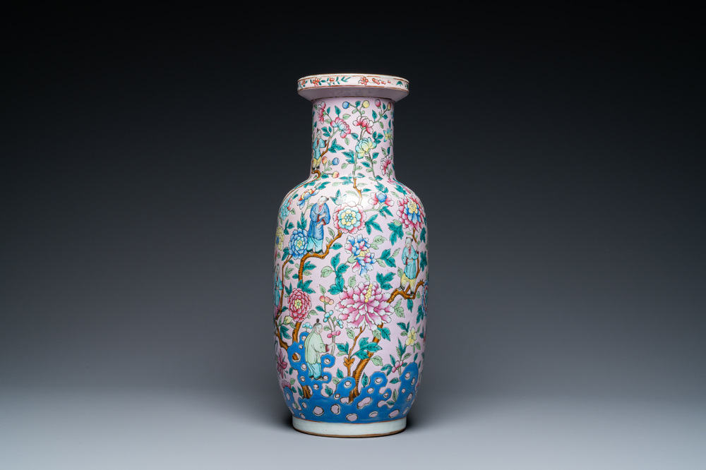 A Chinese pink-ground famille rose rouleau vase, 19th C.