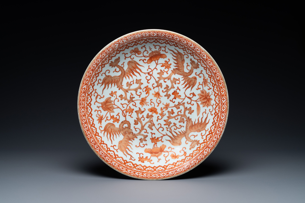 A Chinese iron-red and gilt 'phoenixes' dish, 19th C.