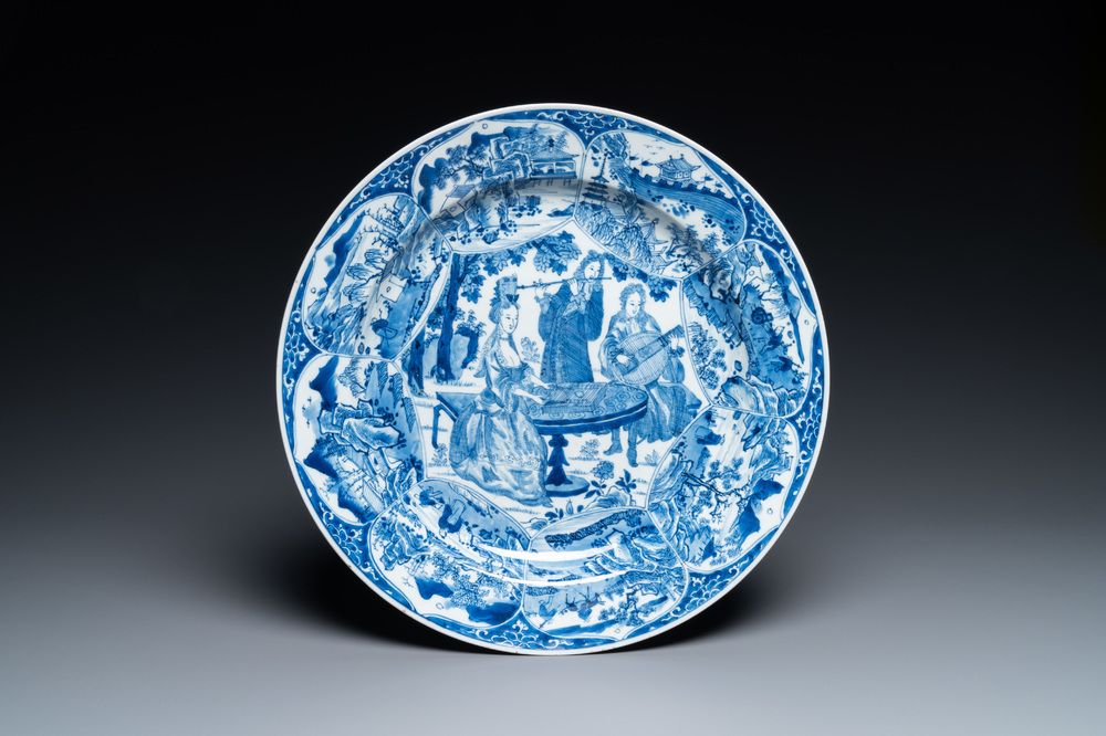 A Chinese blue and white 'musicians' dish, Kangxi