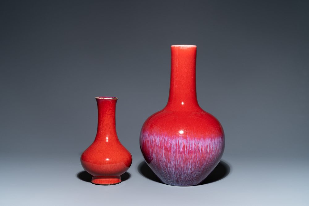 Two Chinese monochrome sang de boeuf-glazed bottle vases, 19th C.