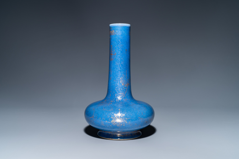 A Chinese gilt-decorated powder blue-ground bottle vase, Kangxi mark, 19th C.