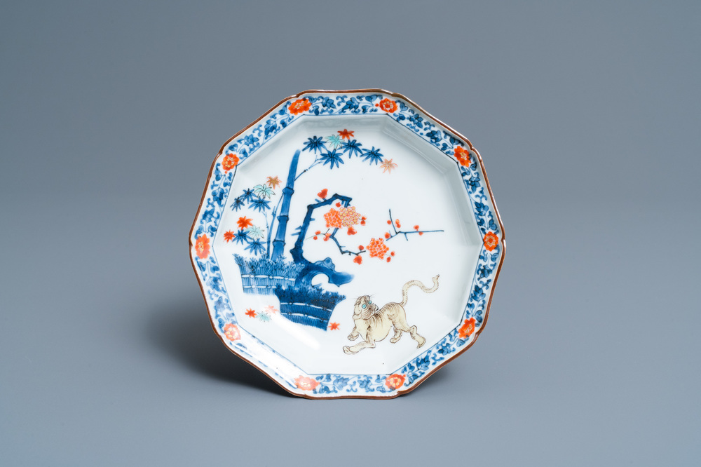 A Japanese Hizen ware Kakiemon-style plate with a tiger below bamboo, Edo, 17th C.