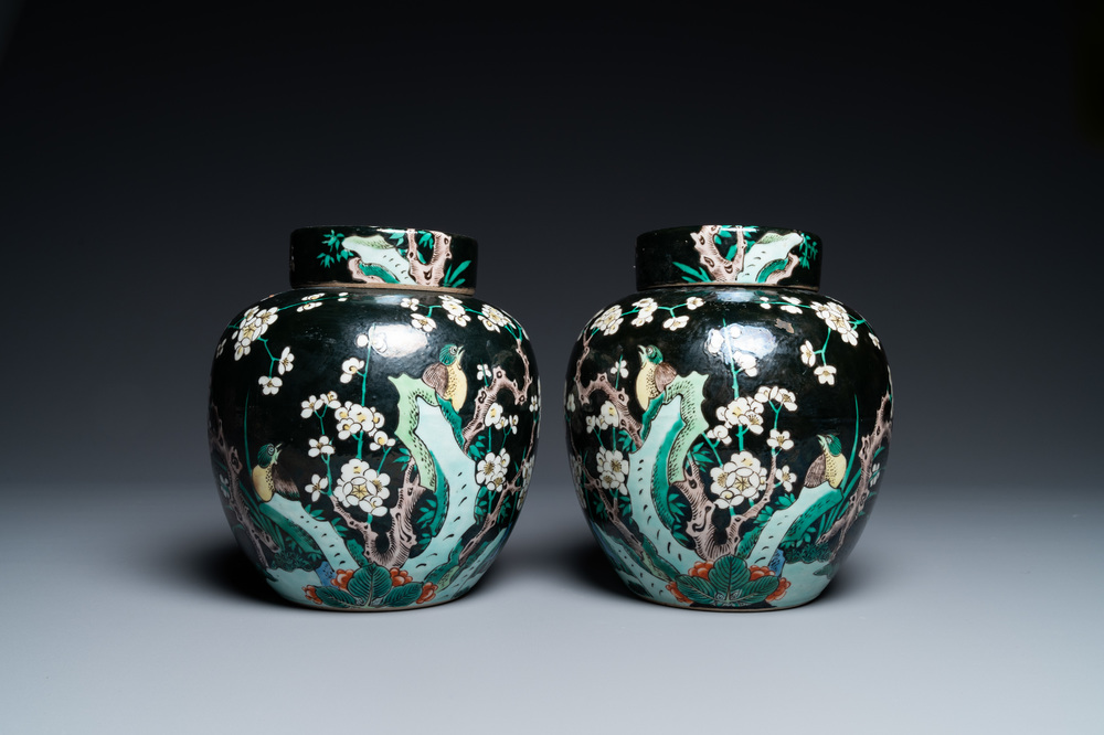A pair of Chinese famille noire jars and covers, 19th C.