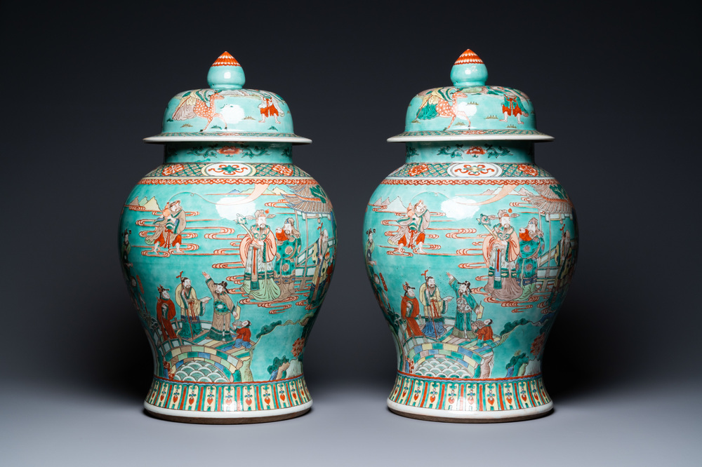 A pair of large Chinese turquoise-ground famille verte vases and covers, 19th C.