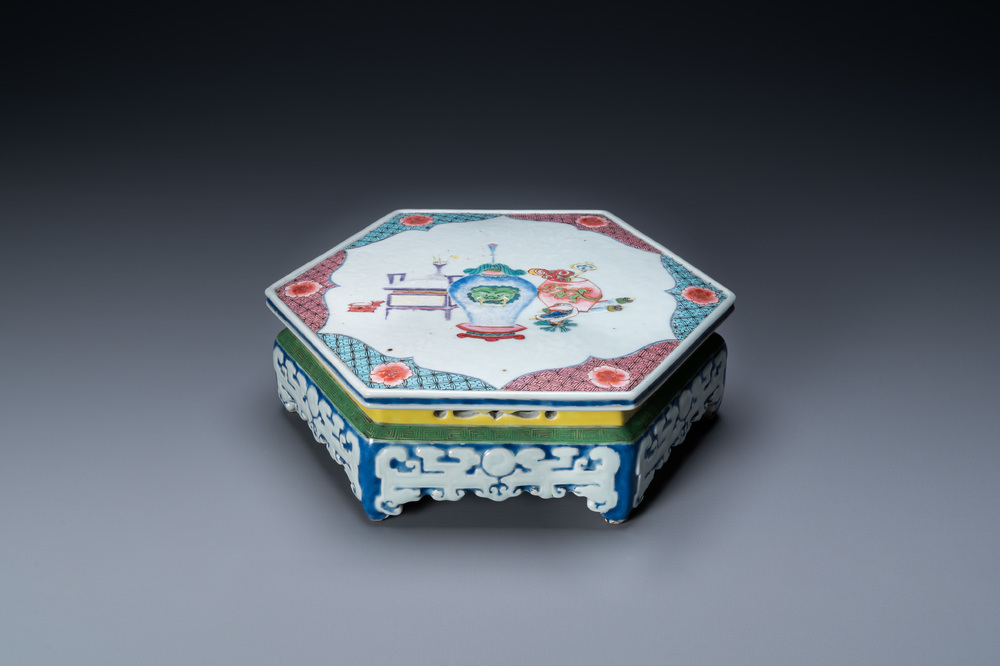 A Chinese famille rose hexagonal 'antiquities' stand, Yongzheng