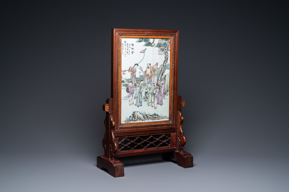 A Chinese wooden table screen with a qianjiang cai plaque, 19th C.