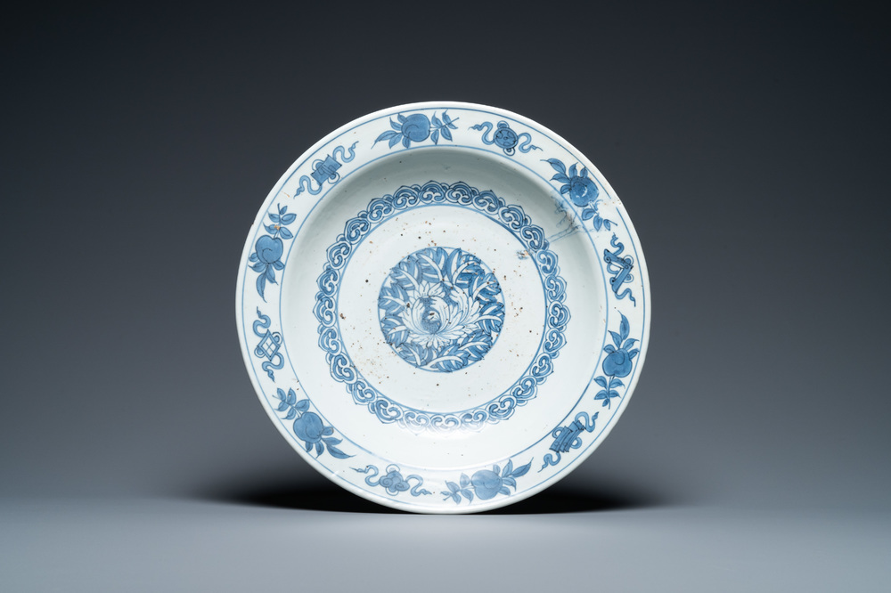 A Chinese blue and white 'peony' dish, Ming