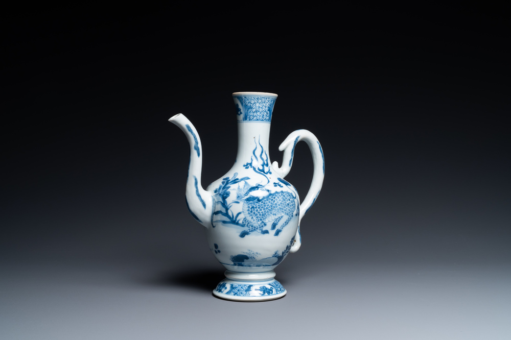 A Chinese blue and white 'qilin and phoenix' ewer, Kangxi