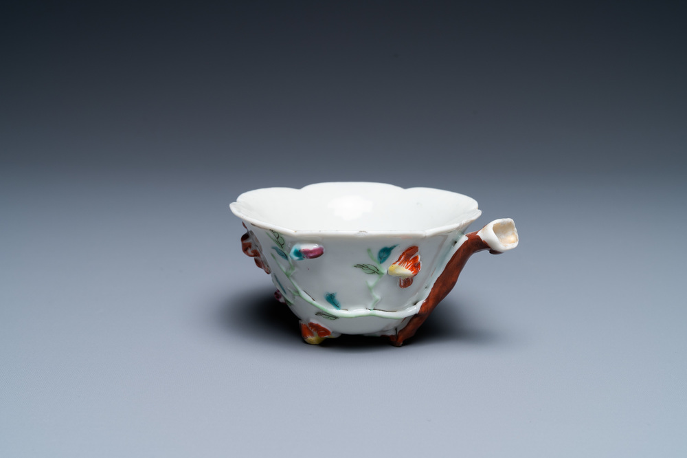 A Chinese famille rose relief-decorated libation cup, Yongzheng
