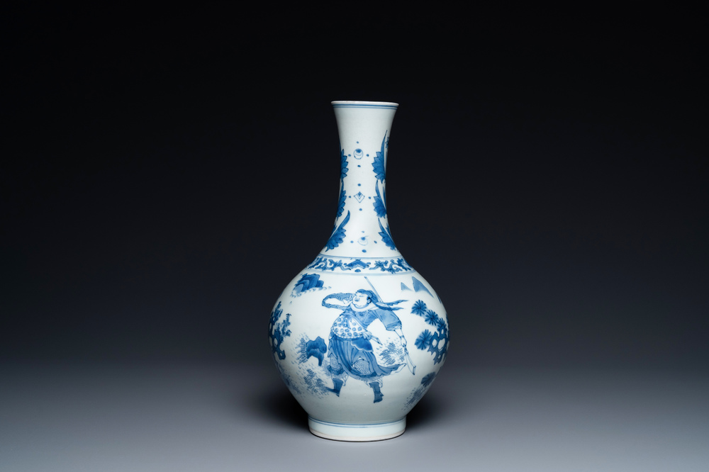 A Chinese blue and white bottle vase depicting four figures, Transitional period