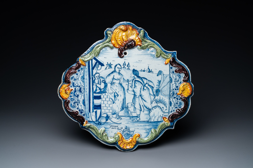 A Dutch Delft blue and white mixed technique biblical subject plaque, 18th C.