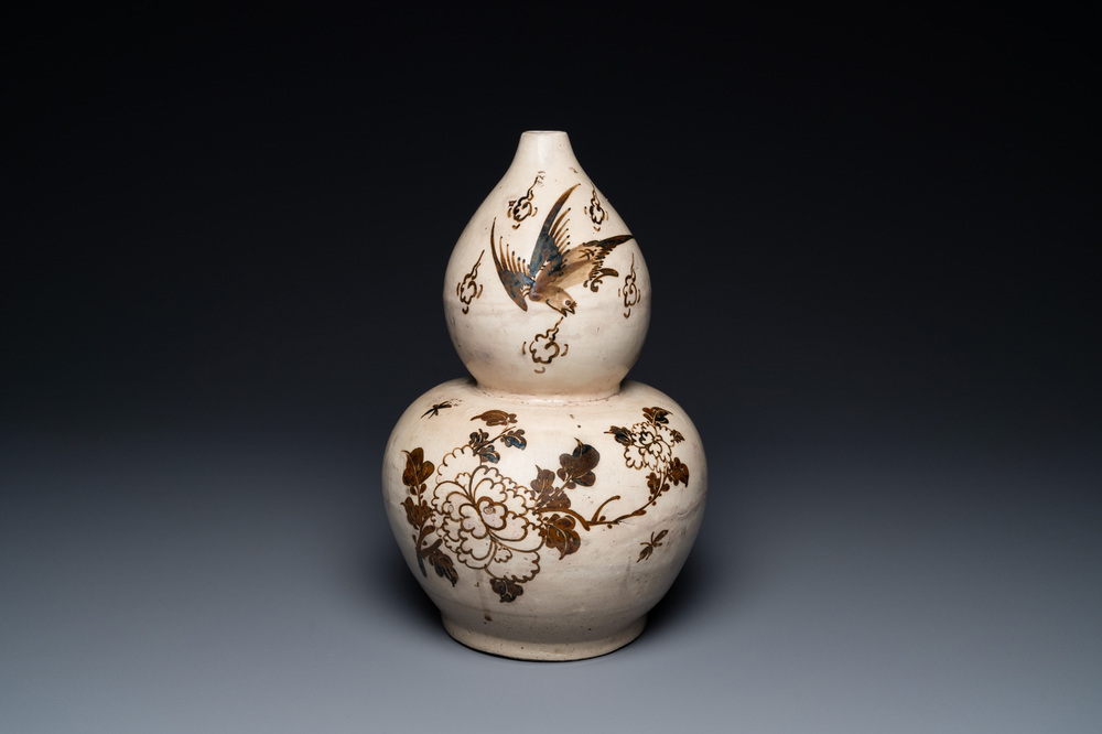 Een Chinese Cizhou kalebasvaas, Song/Yuan