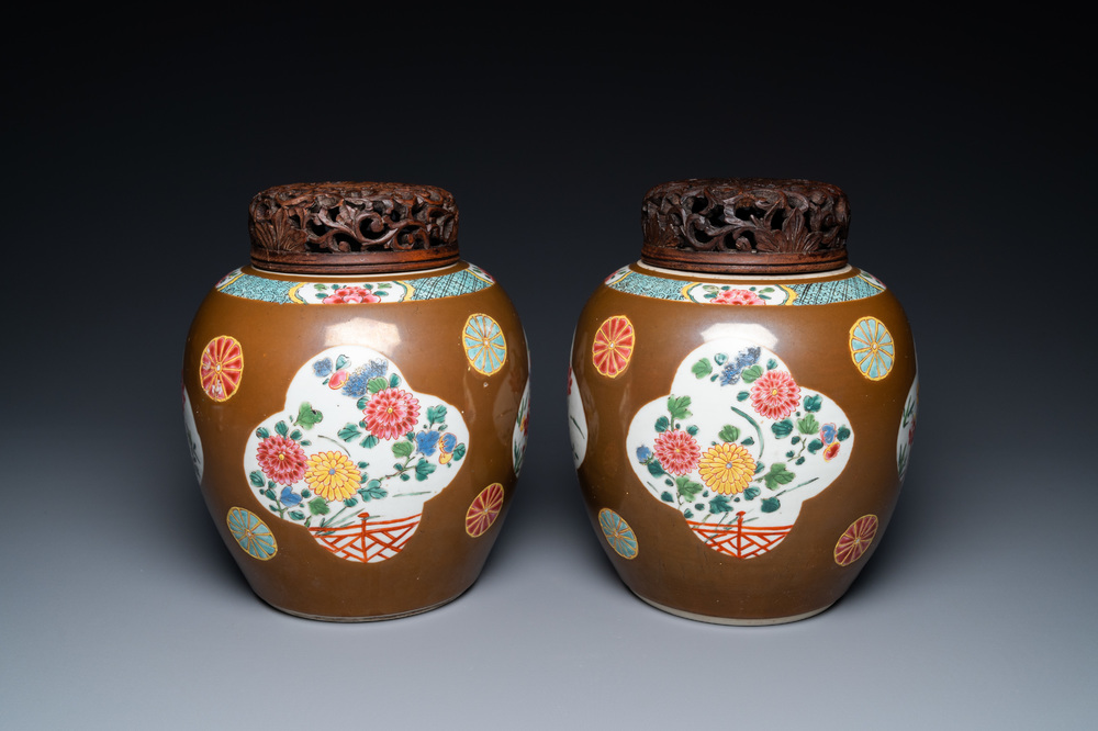 A pair of Chinese famille rose capucin brown-ground jars, Qianlong