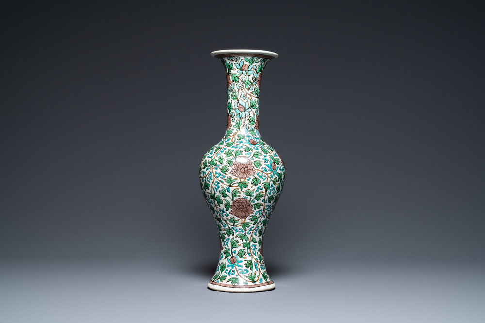 A Chinese verte biscuit 'peony scroll' vase, Ming