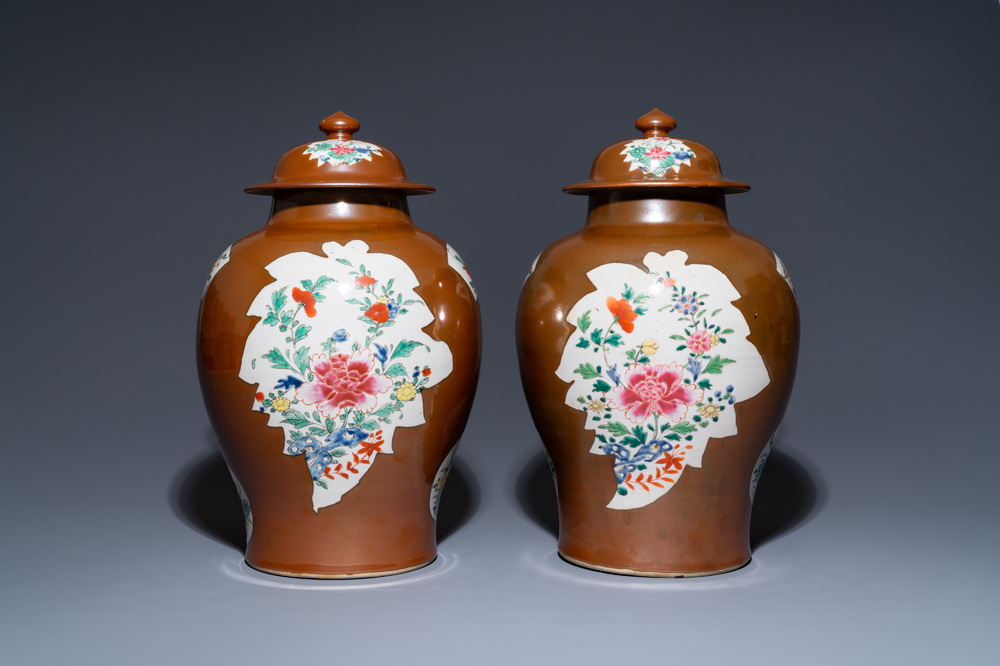 A pair of Chinese famille rose capucin brown-ground vases and covers, Qianlong