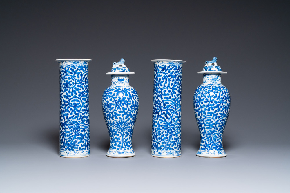 A Chinese blue and white four-piece garniture, Kangxi mark, 19th C.