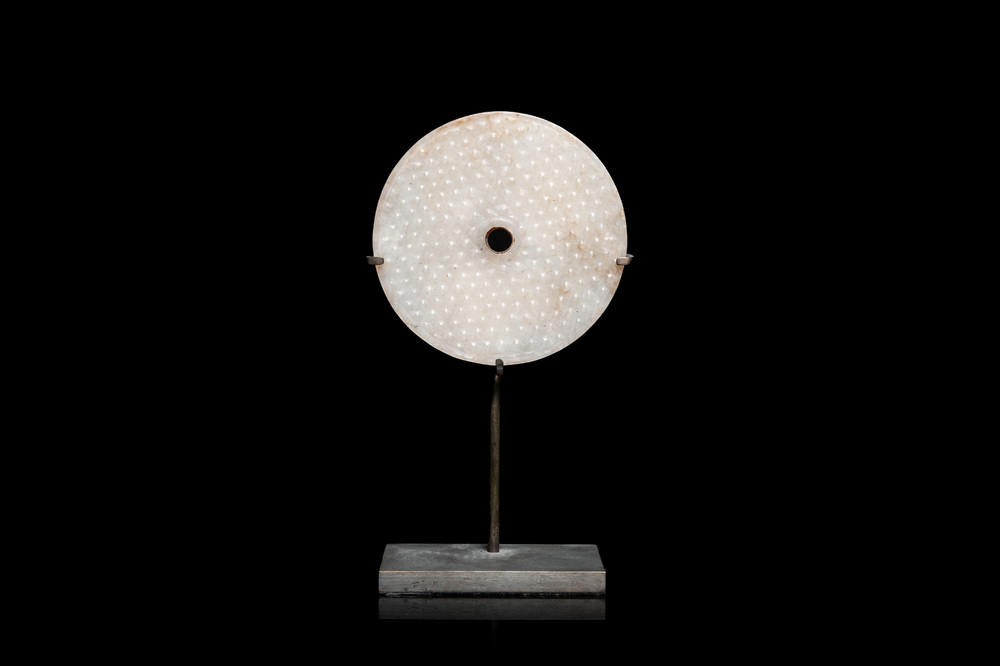 A Chinese white jade bi disc, Han