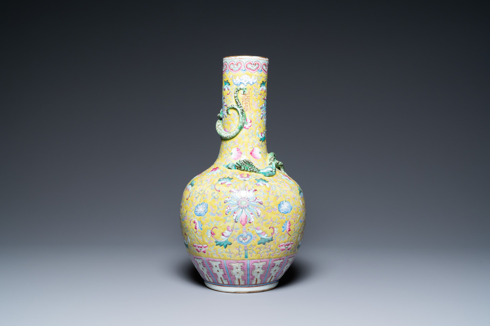 A Chinese yellow-ground famille rose bottle vase, 19th C.