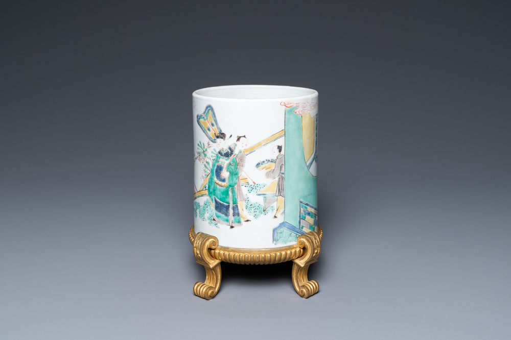 A Chinese famille verte brush pot on gilt bronze stand, Kangxi