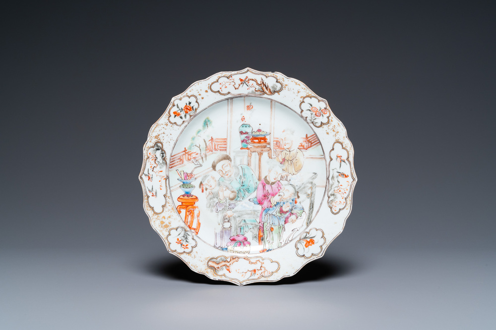 A Chinese famille rose 'mandarin tea drinkers' plate, Qianlong