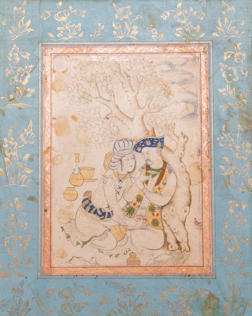 A Persian miniature on paper: 'Loving couple leaning against a tree', 18/19th C.