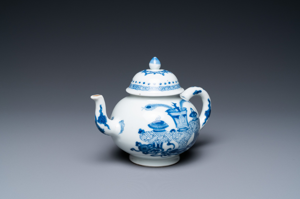 A Chinese blue and white 'antiquities' teapot, Yu mark, Kangxi