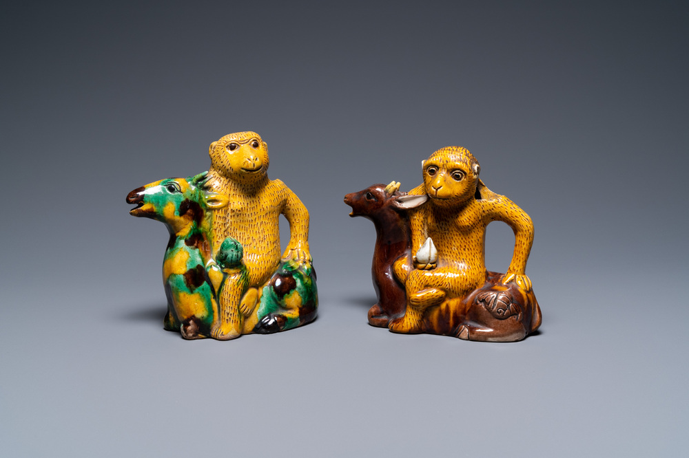 Two Chinese sancai-glazed 'monkey on deer' ewers, 19th C.